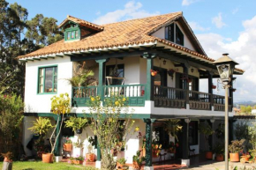 Отель Cabaña la Cattleya de Villa de Leyva  Вилья Де Лейва